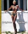Brigitte Nielsen - black panties and stockings.jpg