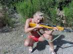 Andrea with SKS paratrooper rifle [18+].jpg
