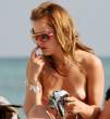 mena_suvari-beach_topless_03.jpg