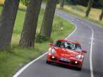 2007-Porsche-Cayman-Red-Front-Tilt-Drive-1600x1200.jpg