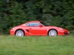 2007-Porsche-Cayman-Red-Passenger-Side-Speed-1600x1200.jpg