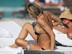 rita-rusic-black-bikini-tanning-miami-03-580x435.jpg