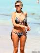 rita-rusic-black-bikini-tanning-miami-04-435x580.jpg