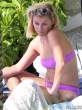 Reese-Witherspoon-Relaxes-Poolside-In-A-Purple-Bikini-In-Honolulu-10-435x580.jpg