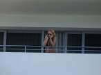 973073292_ritaorahangsoutbalconyx12_123_108lo.jpg