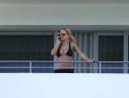 973129600_ritaorahangsoutbalconyx33_123_1199lo.jpg