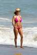 Lisa Rinna  sports a hot pink bikini while on the beach in Malibu. Aug 22, 2010 (6).jpg