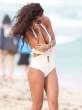Raffaella-Modugno-Wears-A-White-One-PIece-Thong-To-The-Beach-In-Miami-08-675x900.jpg